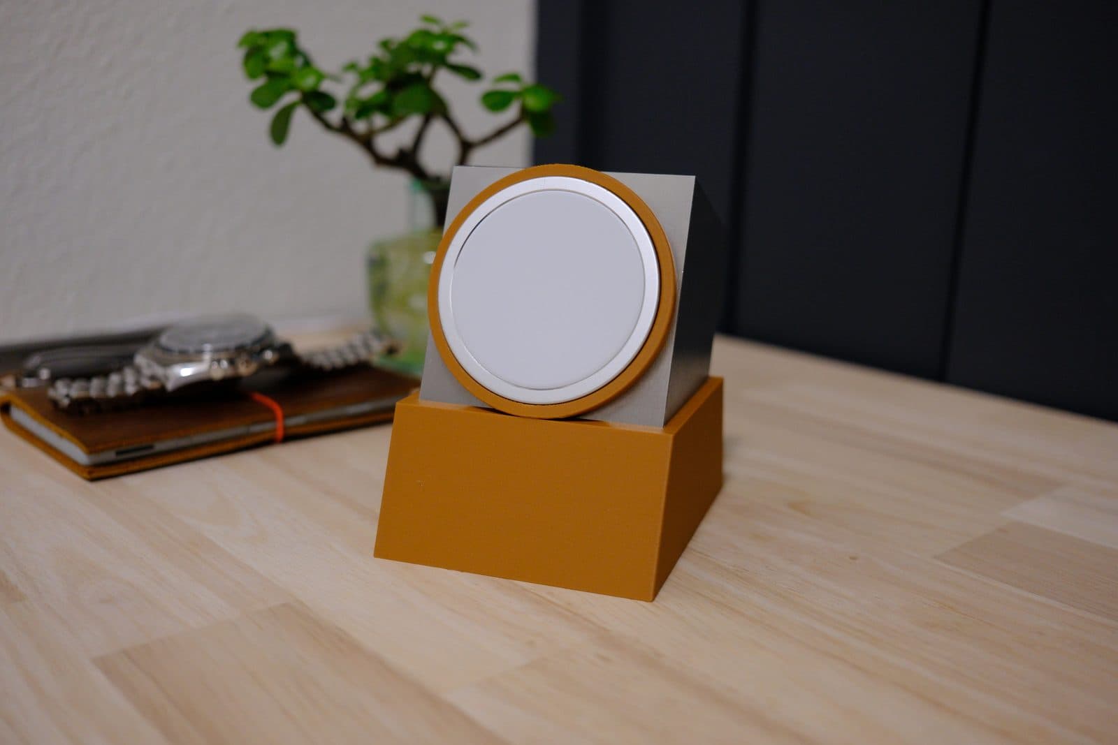 Dock Block printed in orange, with the steel block and MagSafe charger